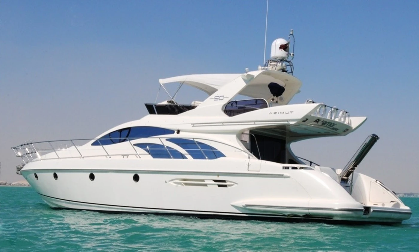 Private luxury yacht cruising through Dubai Marina