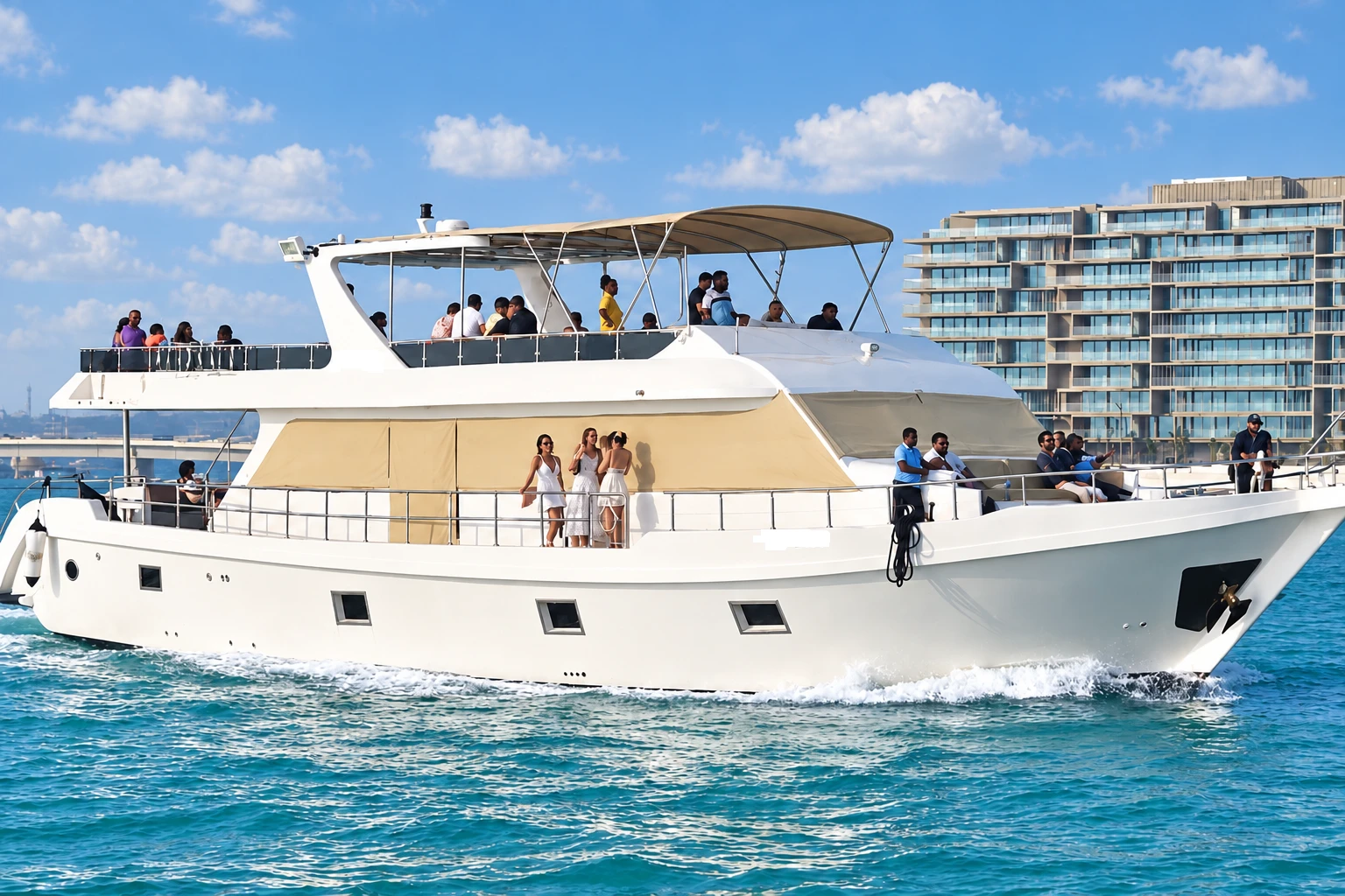Guests enjoying a shared yacht tour in Dubai Marina with views of the waterfront skyline.